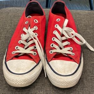 Red converse. Mens size 6 and woman’s size 8.